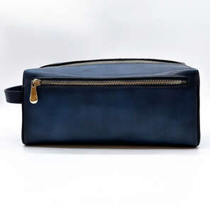 Karun Leather navy blue diamond travel kit with gold-colored accessories