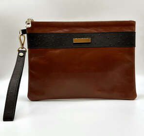 Karun Leather customizable clutch with brown and black leather, gold-colored accessories